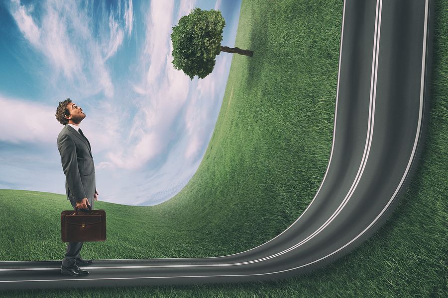 bigstock-Businessman-Observes-The-Road-294551479